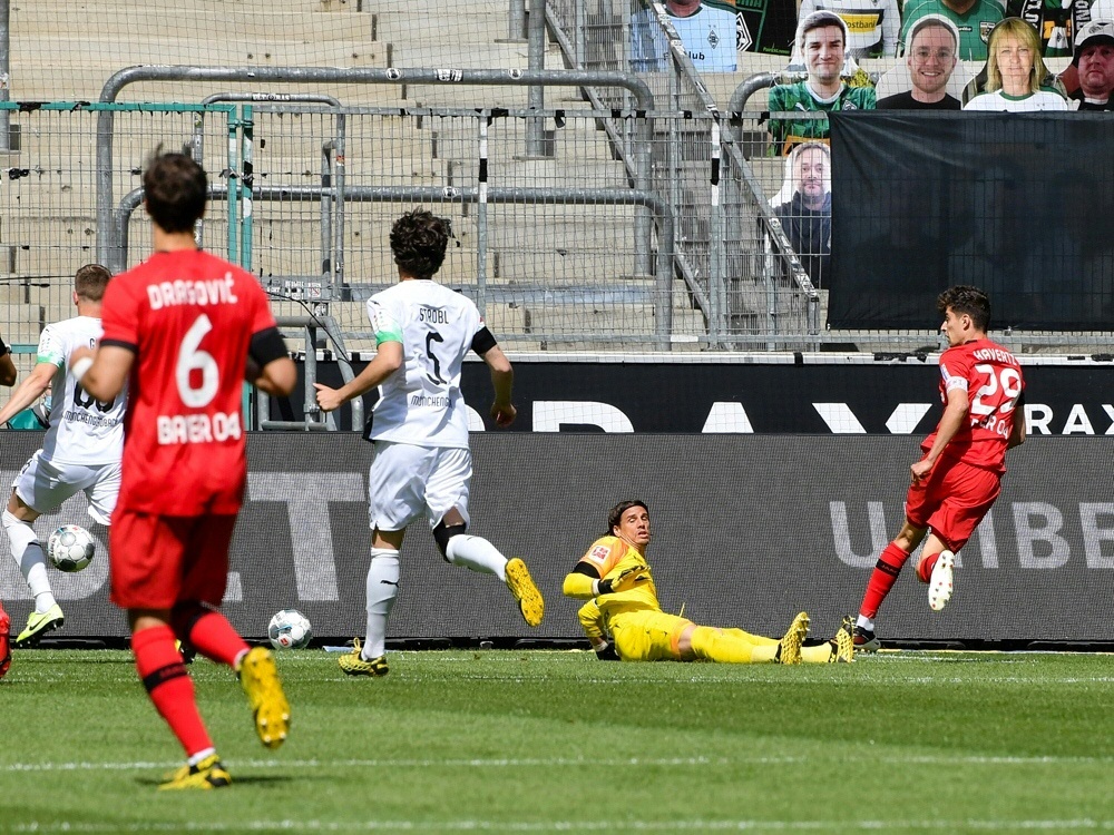 Kai Havertz überwindet Schlussmann Yann Sommer. ©AFP