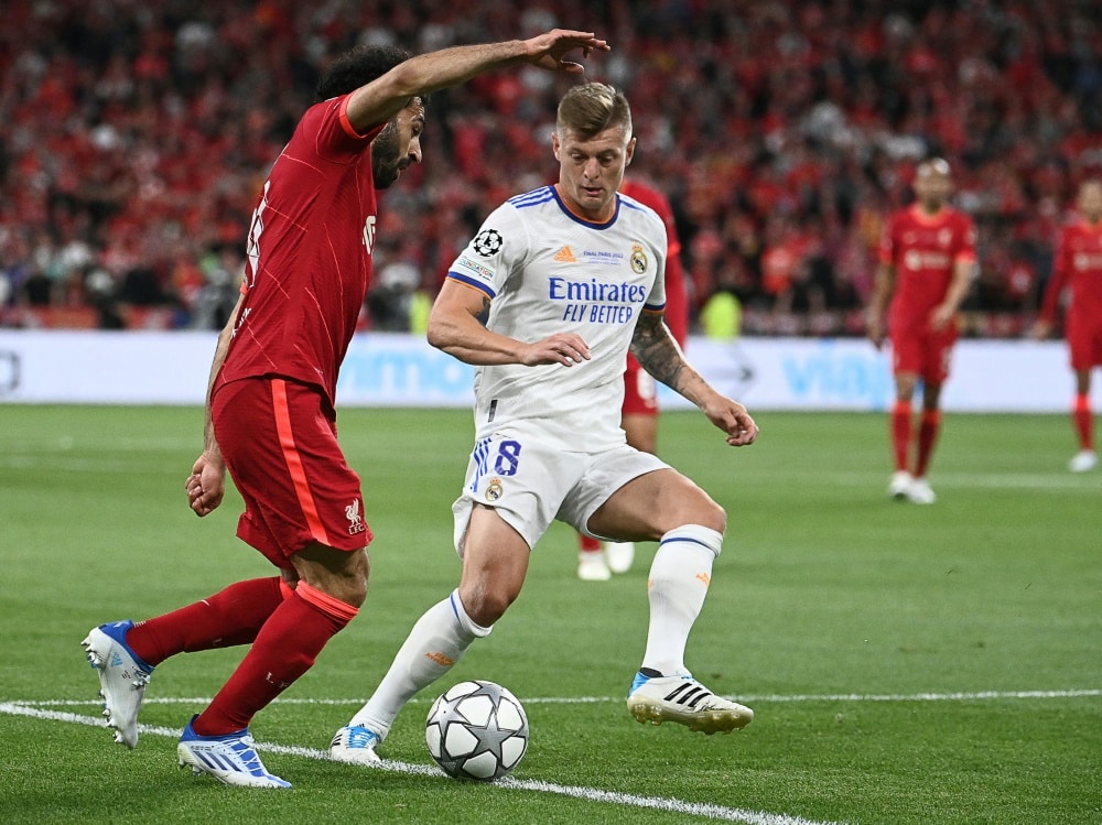 Champions-League-Sieger 2022: Kroos und Real Madrid (© AFP/SID/ANNE-CHRISTINE POUJOULAT)